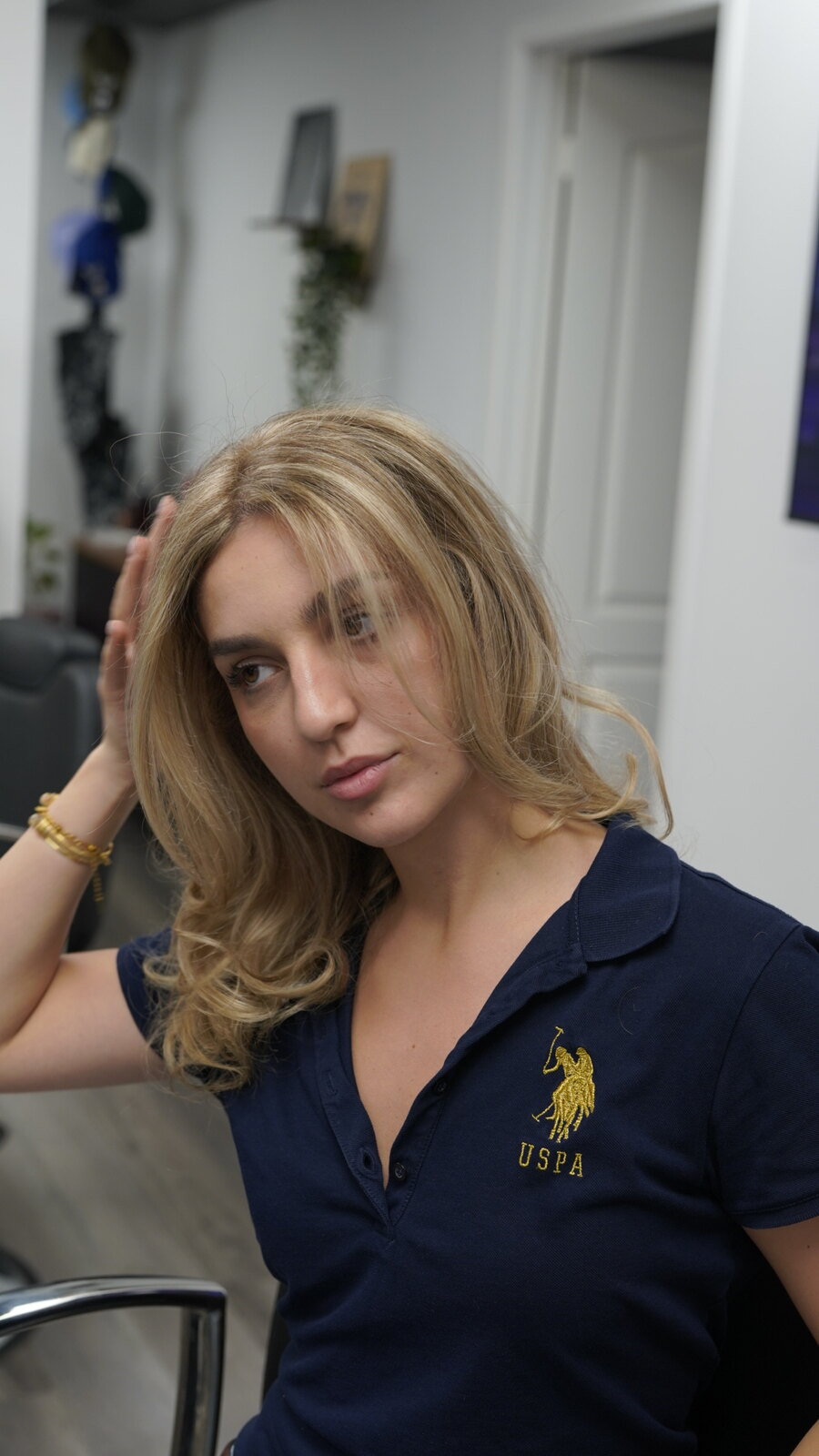 Client showing a blonde face-framing hairstyle at fyf North