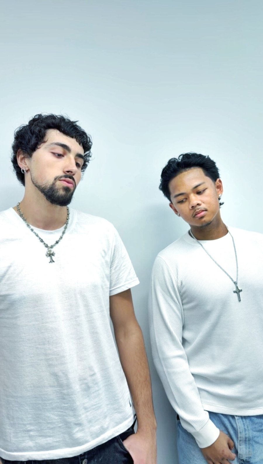 Two clients showing fresh haircuts at fyf North