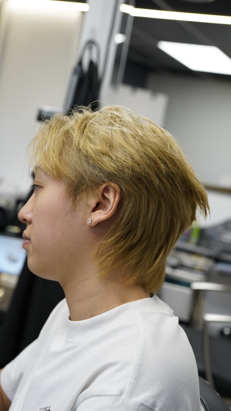 Client showing a blonde layered haircut at fyf North